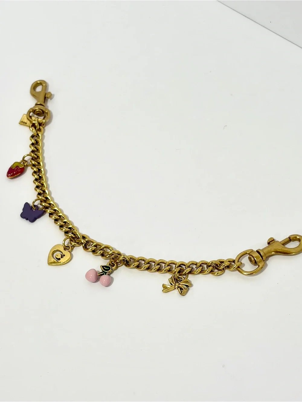 Charming Gold-Tone Swag Bag Chain with Pink Cherry and Multicolor Charms